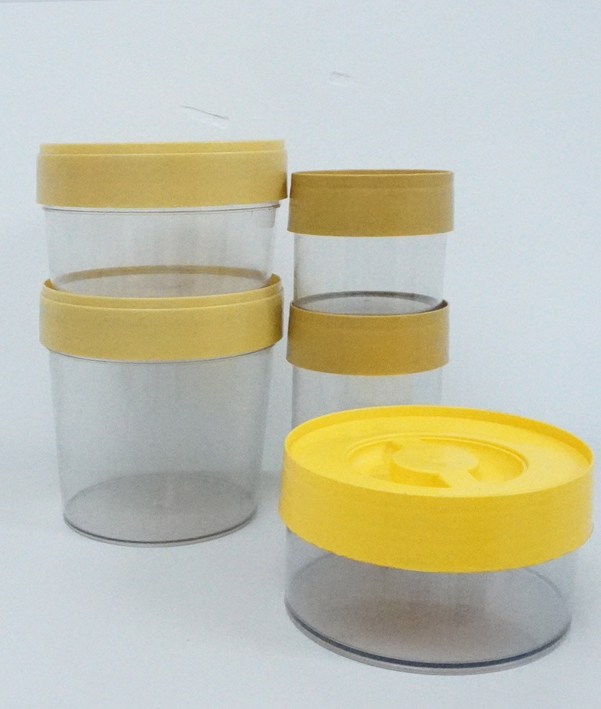 1950s Bee Plastics Yellow Tupperware Storage 5 Piece Set