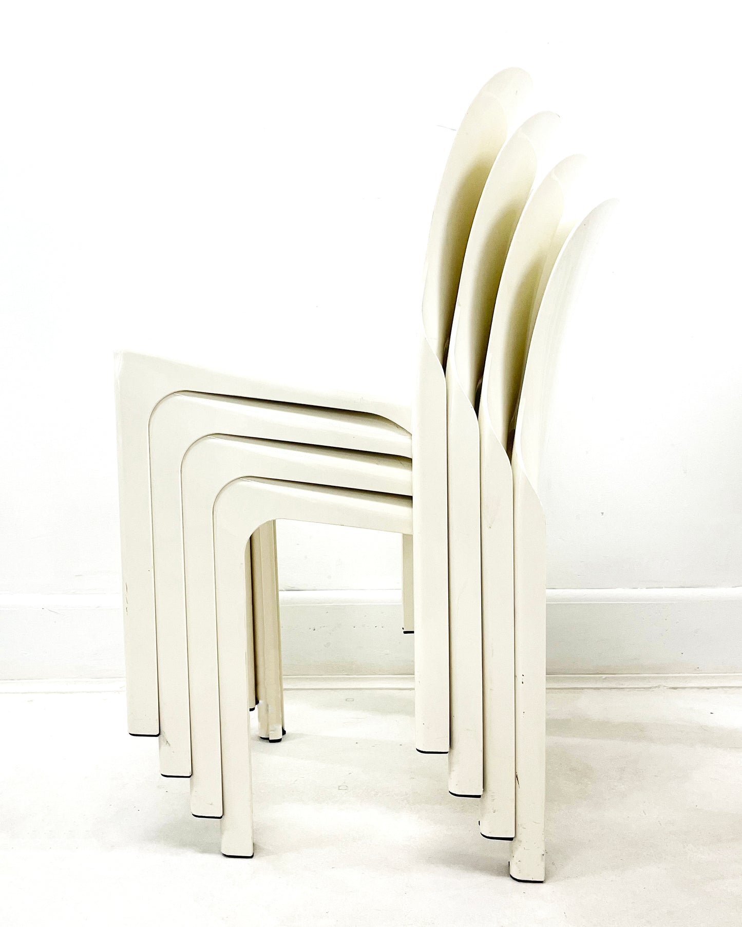 Set of four 1960s White Selene Stacking Chairs by Vico Magistretti for Heller