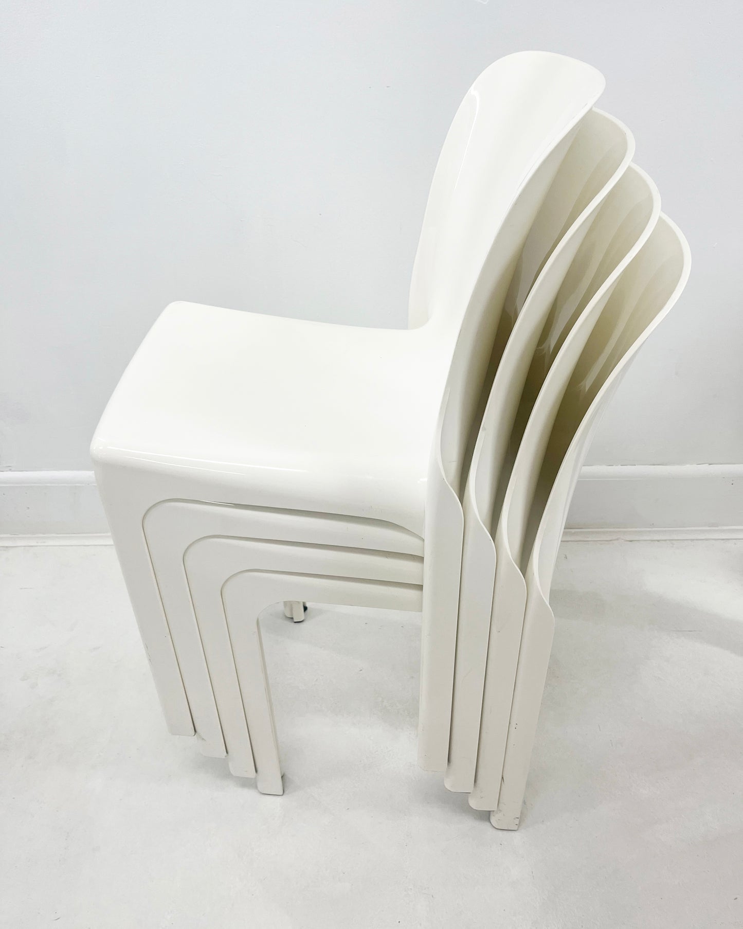 Set of four 1960s White Selene Stacking Chairs by Vico Magistretti for Heller