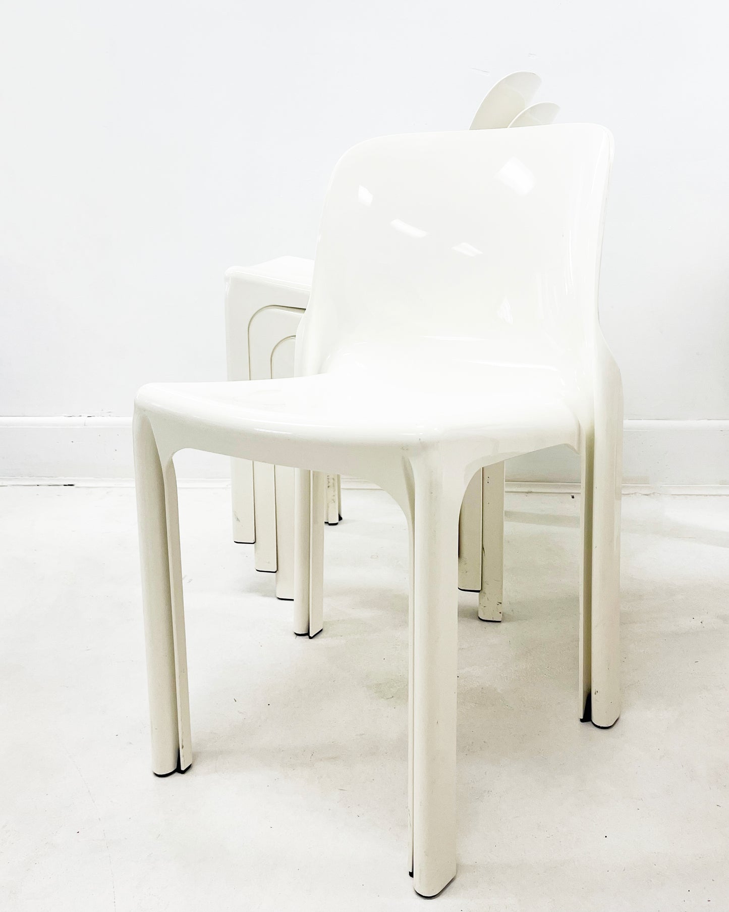 Set of four 1960s White Selene Stacking Chairs by Vico Magistretti for Heller
