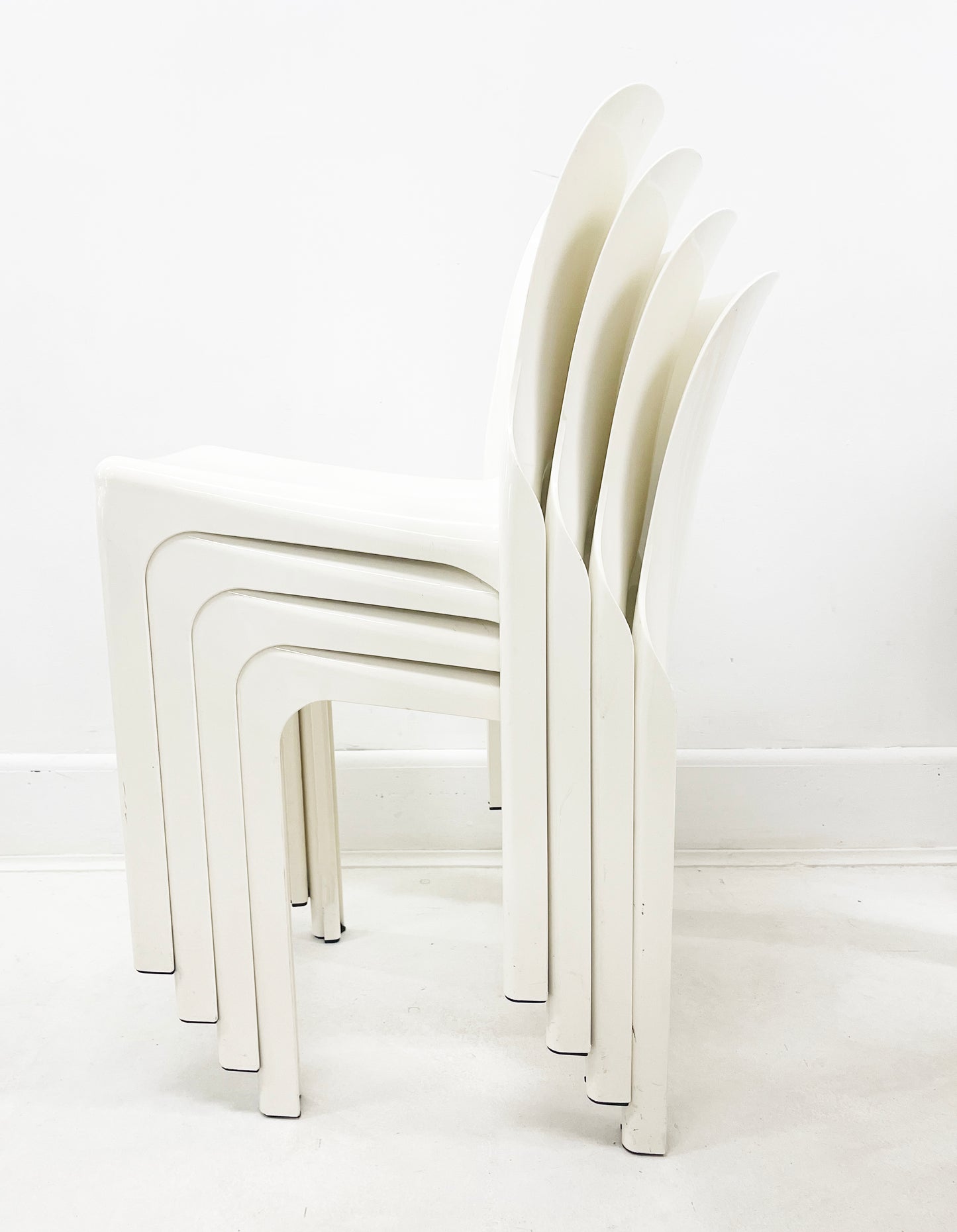 Set of four 1960s White Selene Stacking Chairs by Vico Magistretti for Heller