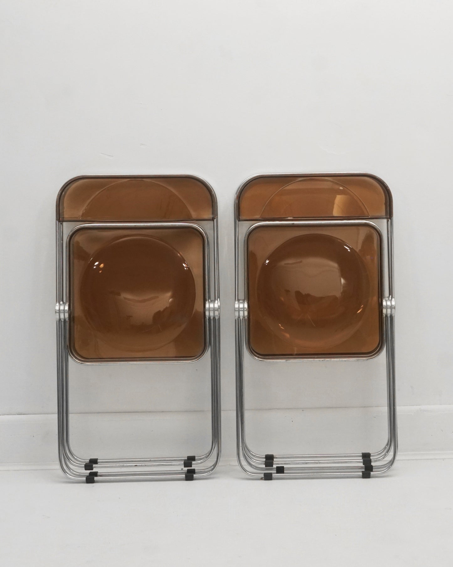 1960s Italian “Plia” Smoked Bronze Lucite Folding Chairs by Giancarlo Piretti for Anonima Castelli